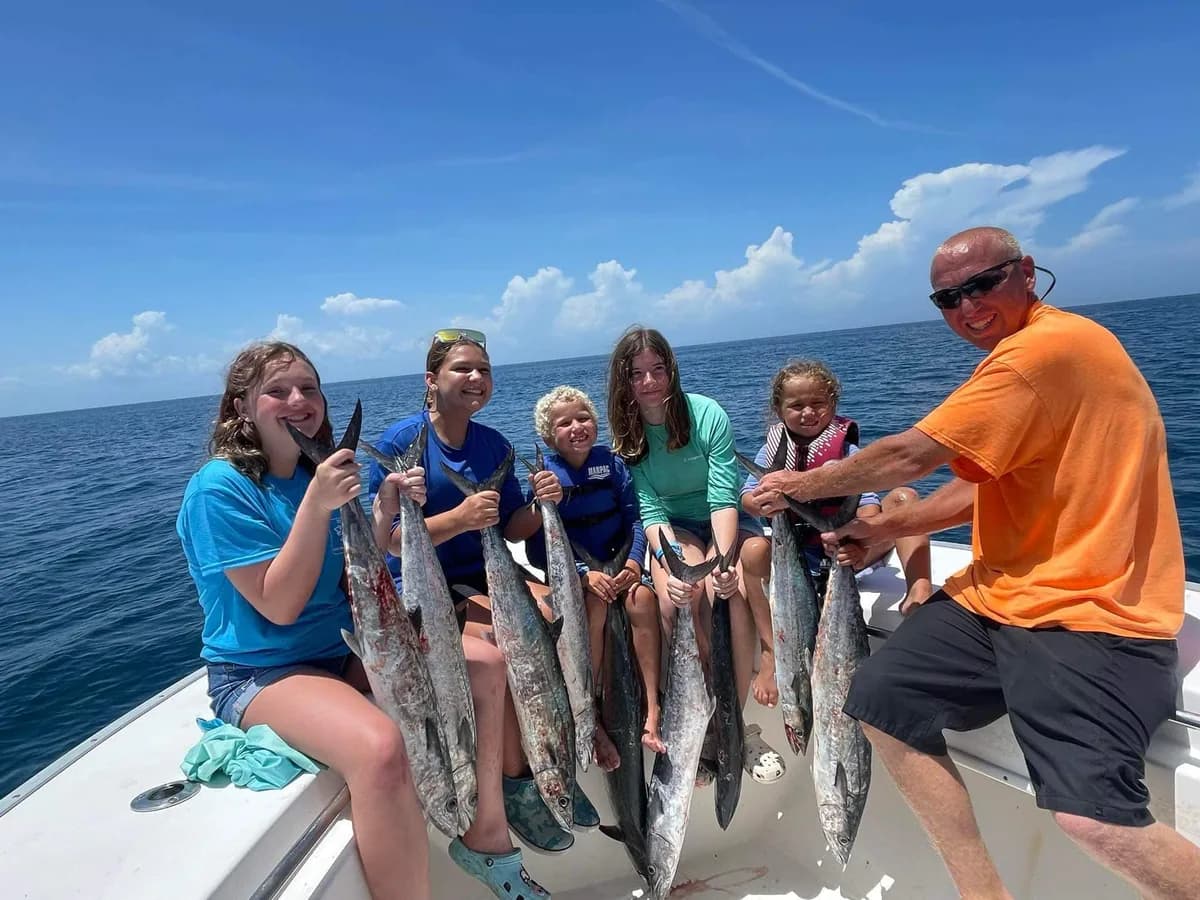 Young anglers on a boat during the Kids Kingfish Derby